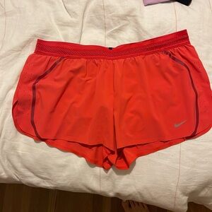Red Nike shorts with liner. Size large. Good condition. Size Large